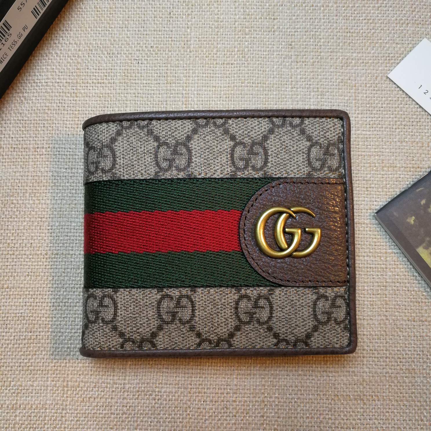 グッチ グッチ 二つ折り財布 557702